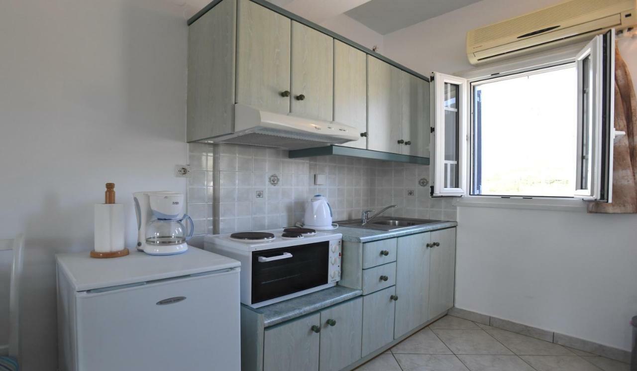 Nostos Beachfront Apartments & Studios Agios Ioannis  Exterior photo